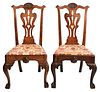 Pair of Walnut Philadelphia Chippendale Side Chairs Having carved top rail over rare pierced splat with heart cut out over slip seats with shell carve
