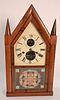 Silas Terry Balance Wheel Fuller Steeple Clock
with tiger maple frame
height 24 1/2 inches 
Provenance: Fifty Year Personal Collection of Clocks and A