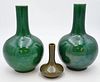 Three Chinese Vases
to include pair of Chinese porcelain vases in globular form with slender neck having green apple crackle glaze,
along with a tea d