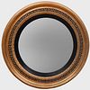 Regency Style Ebonized and Parcel-Gilt Circular Mirror, of Recent Manufacture
