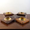 Group of Four Dunhill Brass-Mounted Wood and Glass Ashtrays
