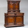 Continental Baroque Style Carved Walnut Two-Part Cabinet, probably Italian