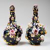 Pair of Paris Blue Ground Porcelain Flower Encrusted Vases and Covers
