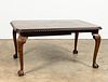 E. 20TH C. MAHOGANY CHIPPENDALE-STYLE DINING TABLE