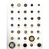 A CARD OF ASSORTED IVOROID (CELLULOID) BUTTONS