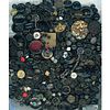 A LARGE BAG LOT OF ASSORTED BLACK GLASS BUTTONS