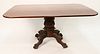 Federal Mahogany Breakfast Top Table
having rectangular top on intricately carved base, set on carved paw feet, single board top
circa 1840, probably 