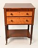 Walsh and Egerton Signed Sheraton Mahogany Two Drawer Work Table
having satin wood drawer fronts, set on turned and fluted legs with remidial shelf to