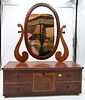 Unusual Federal Mahogany Shaving Mirror
having center door opening to reveal three satin wood drawers, flanked by two drawers on either side that lock