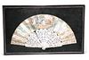 A 19TH CENTURY FRENCH CARVED IVORY FAN, the sticks and guards pierced and c