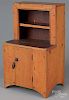 Miniature painted pine stepback cupboard, late 19th c., retaining an old salmon washed surface