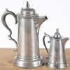 Meriden Brittania pewter syrup, 6 3/4'' h., together with a flagon, attributed to Meriden Brittania