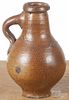 Miniature Bellarmine jug, 18th c., 4 1/2'' h. Provenance: The Estate of Bernard B. Hillmann