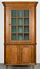 Pennsylvania pine two-part corner cupboard, ca. 1830, 88'' x 44''.