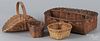 Split oak utensil basket, 19th c., 3 1/2'' h., 12 1/4'' w., together with three other baskets.