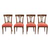 Lote de 4 sillas. SXX. Elaboradas en madera. Con respaldos calados, asientos acojinados  soportes tipo sable. Decoradas con molduras.