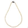 Collar de un hilo de perlas cultivadas, rubíes y broche de plata . 48 perlas cultivadas color crema de 7 mm. 4 rubíes facetados.