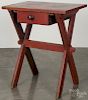 Painted pine and poplar sawbuck table, 19th c., retaining an old red surface, 29 1/4'' h., 24'' w.