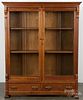 Victorian cherry bookcase, 63 1/4'' h., 48'' w. Provenance: The Estate of Katherine K. Gaeth