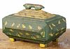 Carved and painted tramp art box, early 20th c., retaining an old green and yellow surface, 7'' h.