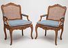 Pair of Early Louis XV Style Beechwood and Caned Fauteuils à La Reine