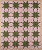 Pineapple variant patchwork quilt, early 20th c., 84'' x 70''.