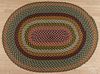 Oblong braided rug, 6'9'' x 5'. Provenance: The Estate of Mark and Joan Eaby, Brownstown, Pennsylvania