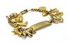 A gold filled identity bracelet with gold charms,