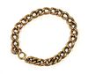 A gold hollow curb link bracelet,