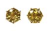 A pair of gold single stone yellow sapphire stud earrings