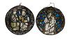 A PAIR OF 17TH OR 18TH C. ENGLISH STAINED GLASS RONDELS ENHANCED BY ENAMEL PAINTED DETAILS