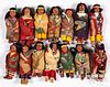 Fourteen Native American Skookum dolls, 20th c.