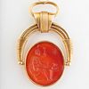 Carnelian Agate Intaglio of Haphaestus at His Forge Set in a Gold Swivel Pendant