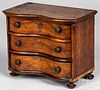 Miniature serpentine front walnut chest of drawers