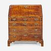 A Chippendale carved tiger maple slant-front desk New England, circa 1790