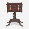 A Classical carved mahogany and rosewood work table Attributed to Anthony G. Quervelle (1789-1856), Philadelphia, PA, circa 1820