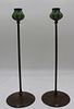 A Pair Of Bronze Tiffany Style Candlesticks