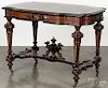 Aesthetic movement marquetry inlaid walnut center table, mid 19th c., 30 1/2'' h., 44'' w., 28 1/2'' d.