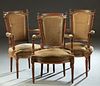 Set of Three Carved Beech Louis XVI Style Fauteuils, late 19th c., the carved canted upholstered back over curved upholstered arms, to a bowed seat, o