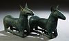 Pair of Patinated Bronze Seated Dog Figures, 20th c., H.- 11 3/8 in., W.- 16 1/2 in., D.- 4 1/2 in. Provenance: Palmira, the Estate of Sarkis Kaltakdj