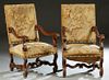 Pair of French Louis XIV Style Carved Walnut Fauteuils a la Reine, late 19th c., the canted back over acanthus carved scrolled arms, to cushioned seat