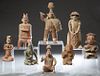 Group of Eight Pre-Columbian Style Pottery Figures, 20th c., three standing and five seated, some with painted decoration, Tallest Standing- H.- 15 in