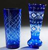 Two Cobalt Cut-to-Clear Vases, 20th c., one of cylindrical form; the other of tapered bulbous form, Bulbous- H.- 16 in,. Dia.- 6 3/4 in. Provenance: P