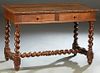 French Louis XIII Style Carved Oak Writing Table, 19th c., the carved edge top over two frieze drawers on rope twist trestle supports, joined by rope 