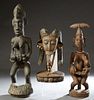 Group of Three Large Carved Wood African Figures, 20th c., consisting of two female fertility figures, one with beaded jewelry; and an antelope with c