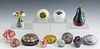 Group of Thirteen Glass Paperweights, 20th c., four millefiori examples; four art glass examples; one mushroom shaped with a mouse on top; a cat; and 