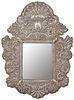 Mirror; Novo-Hispanic work, c. 1760-1770. 
Carved silver and wooden core. 
It presents damages.