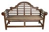 Teak Outdoor Bench, height 41 1/2 inches, length 65 inches.