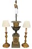 Three Table Lamps, to include a pair of French gold gilt candlestick lamps, having all over scrollwork design, height 17 1/2 inches; along with an urn