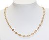 A gold hessonite garnet rivière necklace,